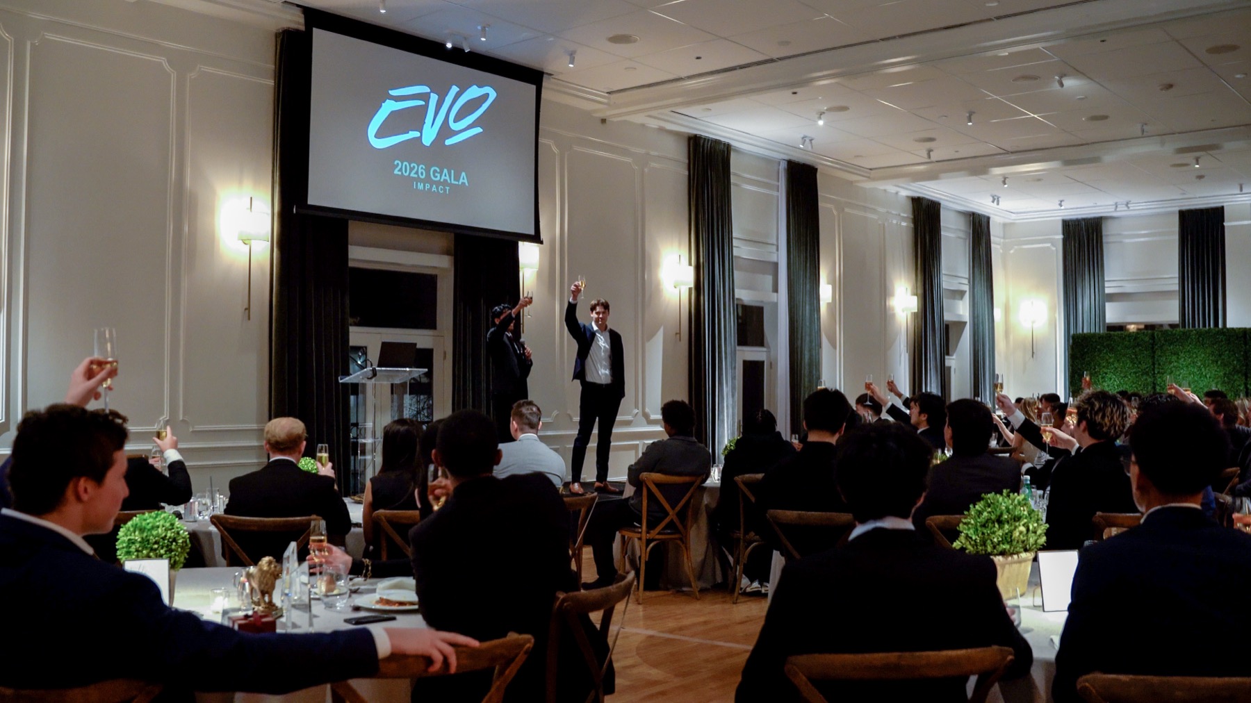 Evo interns learning together at a summer sales training event